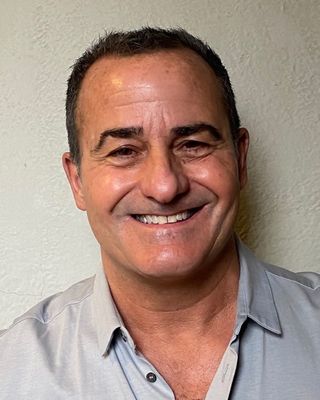 Photo of John F Mondanaro, PhD, LCAT, MT-BC