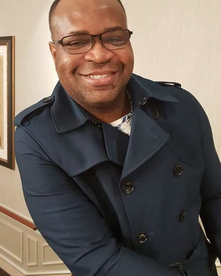 Photo of Christian Bimbola Ogbah, Registered Social Worker, MSW, MFMH