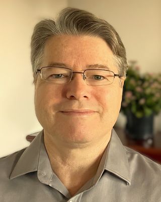 Photo of Ken Raymond, Registered Psychotherapist, BA, MA, CCC, RP