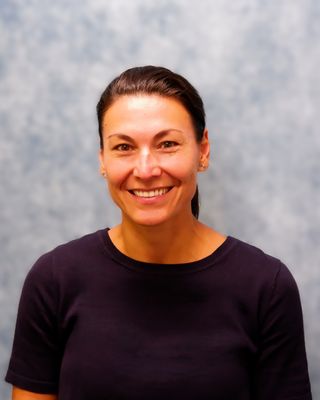 Photo of Dr. Komila Brennan, Psychologist, PhD