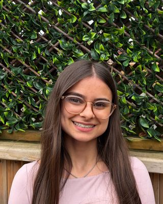 Photo of Emily Oliveira-Mastrangelo, Pre-Licensed Professional