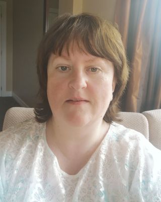 Photo of Caitríona Nic Éinrí, Psychotherapist, DCounsPsych, NAPCP