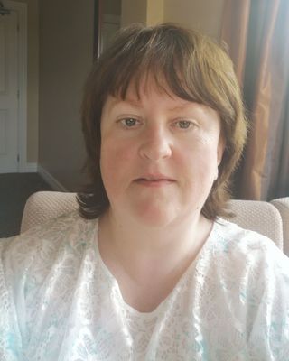 Photo of Caitríona Nic Éinrí, Psychotherapist, DCounsPsych, APCP