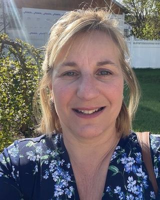 Photo of Cornelia Na Salone, Counselor, LMHC