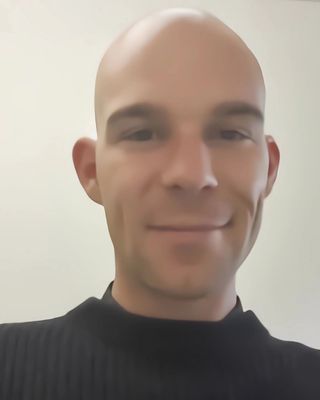 Photo of Edward Janik Higgins, Counsellor, MA, BACP