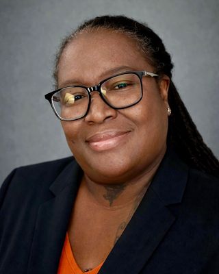 Photo of Dr. Kisha Norman, Licensed Clinical Mental Health Counselor, PhD, LCMHC, LCAS, NCC, BC-TMH