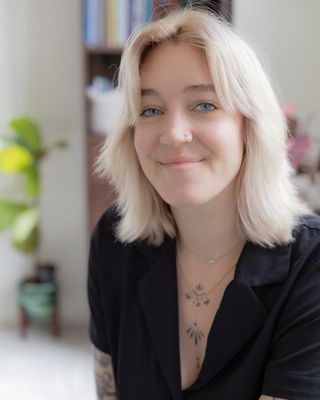 Photo of Sav Raynor, Marriage & Family Therapist, MS, LMFT, 200 RYT