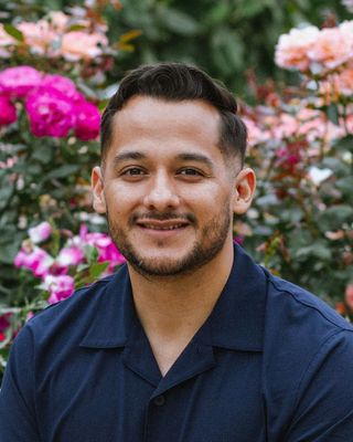 Photo of Adrian Rodriguez, Marriage & Family Therapist, MA