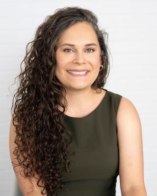 Photo of Michele Flores, LPC, LCAT, R-DMT, Licensed Professional Counselor