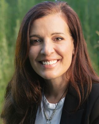 Photo of Kristin Fehrer, MEd, MA, LCPC, Counselor