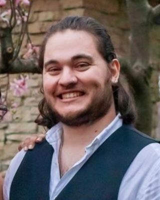 Photo of Alex Reid, Licensed Master Social Worker, LMSW