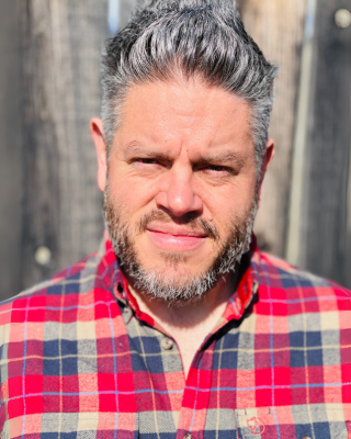 Photo of Dr. John Álvarez, Counsellor, MD, MA, RCC, CGP, PATGC