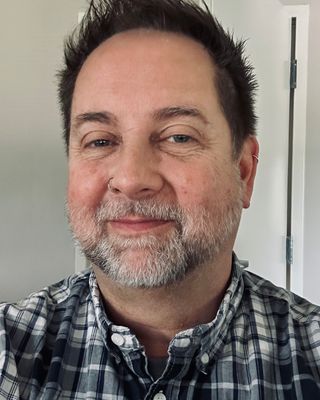 Photo of J Bass, Counselor, MA, LCMHC, LCAS, NCC