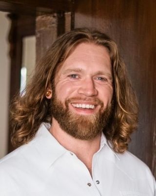 Photo of Dr. Connor Champion, Psychiatrist, MD, CST