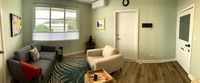 Gallery Photo of Tropical Room 204 at Center for Healing & Transformation.  LENS Neurofeedback offered in all rooms.
