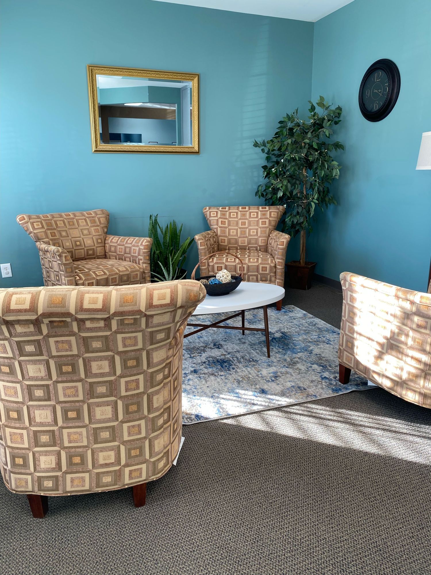 Gallery Photo of Our cozy waiting room with pretty comfortable chairs. Come in and make yourself at home.