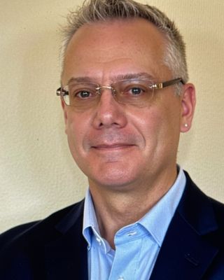 Photo of Dr. W Michael Rogers, Psychologist, PsyD, CCTP