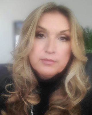 Photo of Kellie Santos, Licensed Clinical Professional Counselor, PhD, LCPC