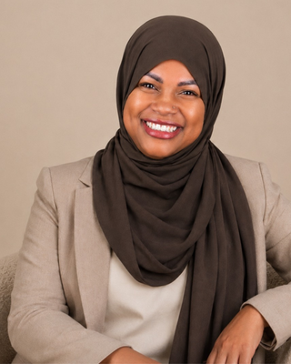 Photo of Muna Sayid, Registered Psychotherapist (Qualifying), MA, BHSc