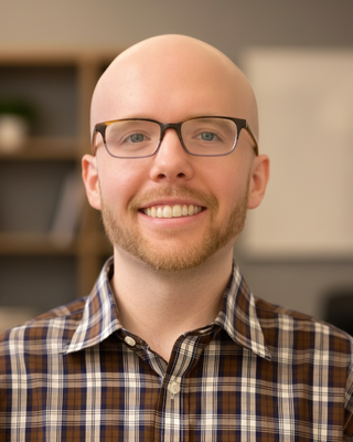 Photo of Dr. Adam Henderson, Psychiatrist, MD