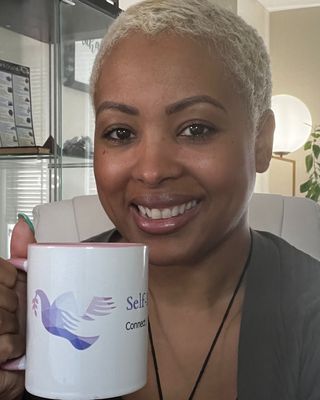 Photo of Kerrin St-Omer, Counsellor, RTC, MBP, Reiki