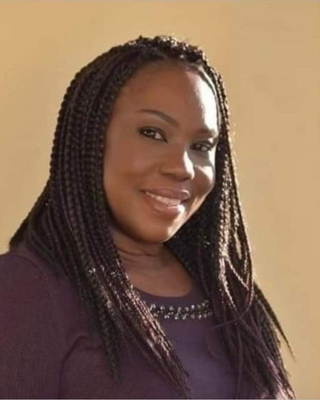 Photo of Temitayo Onamusi, Psychiatric Nurse Practitioner, PMHNP