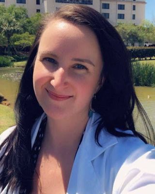 Photo of Michaela Garrison - Mended Therapy Group, Psychiatric Nurse Practitioner, PMHNP, BC