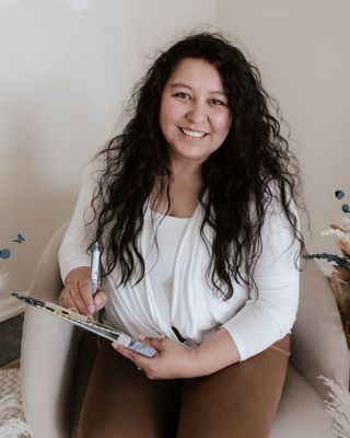 Photo of Gennesis C Popovici, Counselor, MS, LPC