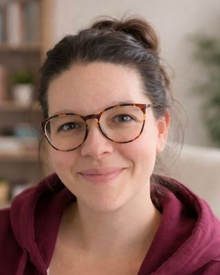 Photo of Alexi Voelk, Registered Psychotherapist, MA