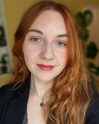 Photo of Dr. Laura Lovejoy, Psychotherapist, PhD, MIAHIP