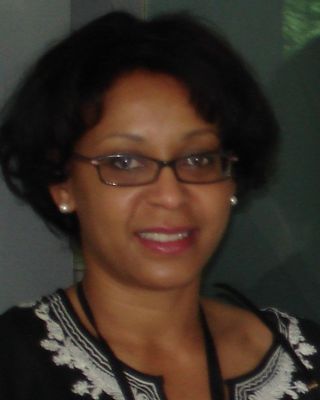 Photo of Mackie Alexis, Psychiatric Nurse Practitioner