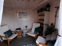 Gallery Photo of Comfortable, relaxing therapy room, set in a private garden. Washroom for art materials and private toilet facilities, are found next to this room.