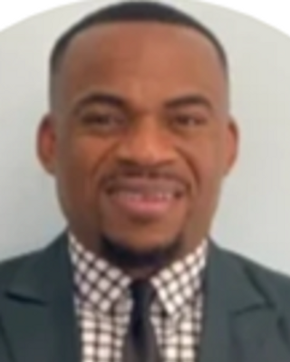 Photo of Olakunle Adenugba, Psychiatric Nurse Practitioner, PMHNP