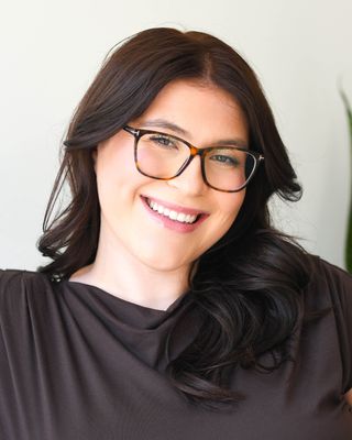 Photo of Angela Valela, Registered Psychotherapist (Qualifying), RP(Q), MACP, MEd