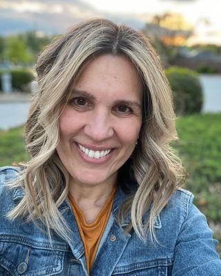 Photo of Kat Oliveira, Licensed Professional Counselor, MA, LCMHC, NCC