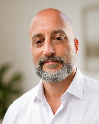 Photo of Dr. Justin Bush, Psychologist, PhD