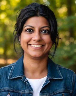 Photo of Kiran Narang, Social Worker, AMHSW