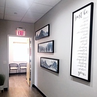 Gallery Photo of Custom Just Be sign welcomes clients back to our offices.