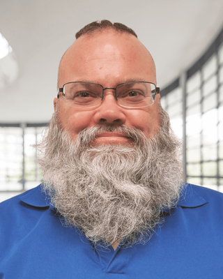 Photo of Dennis Dj Jones, Registered Mental Health Counselor Intern, USMC, PhD, NLP, CHP