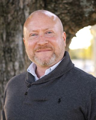 Photo of Travis Hill, Licensed Professional Counselor, LPC, MHSP