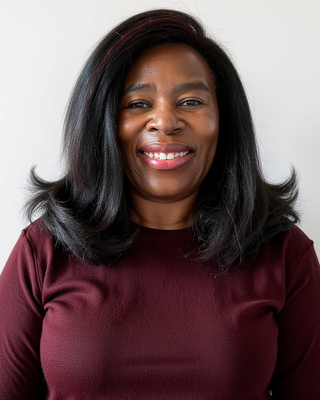 Photo of Febbie Mutindori, Psychiatric Nurse Practitioner, PMHNP, BC