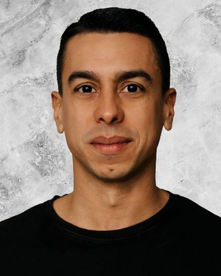 Photo of Alex St John, Registered Psychotherapist, MA, RP