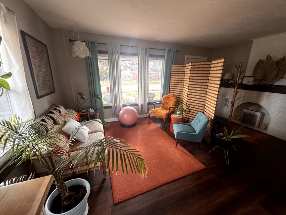 A warm and cozy waiting room before entering into your session