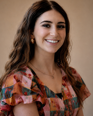 Photo of Skyla Plumlee, Counselor, MS, LAC