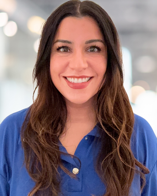 Photo of Cristina I. Ally, Licensed Mental Health Counselor, LMHC, RPT, NCC, QS, EMDR