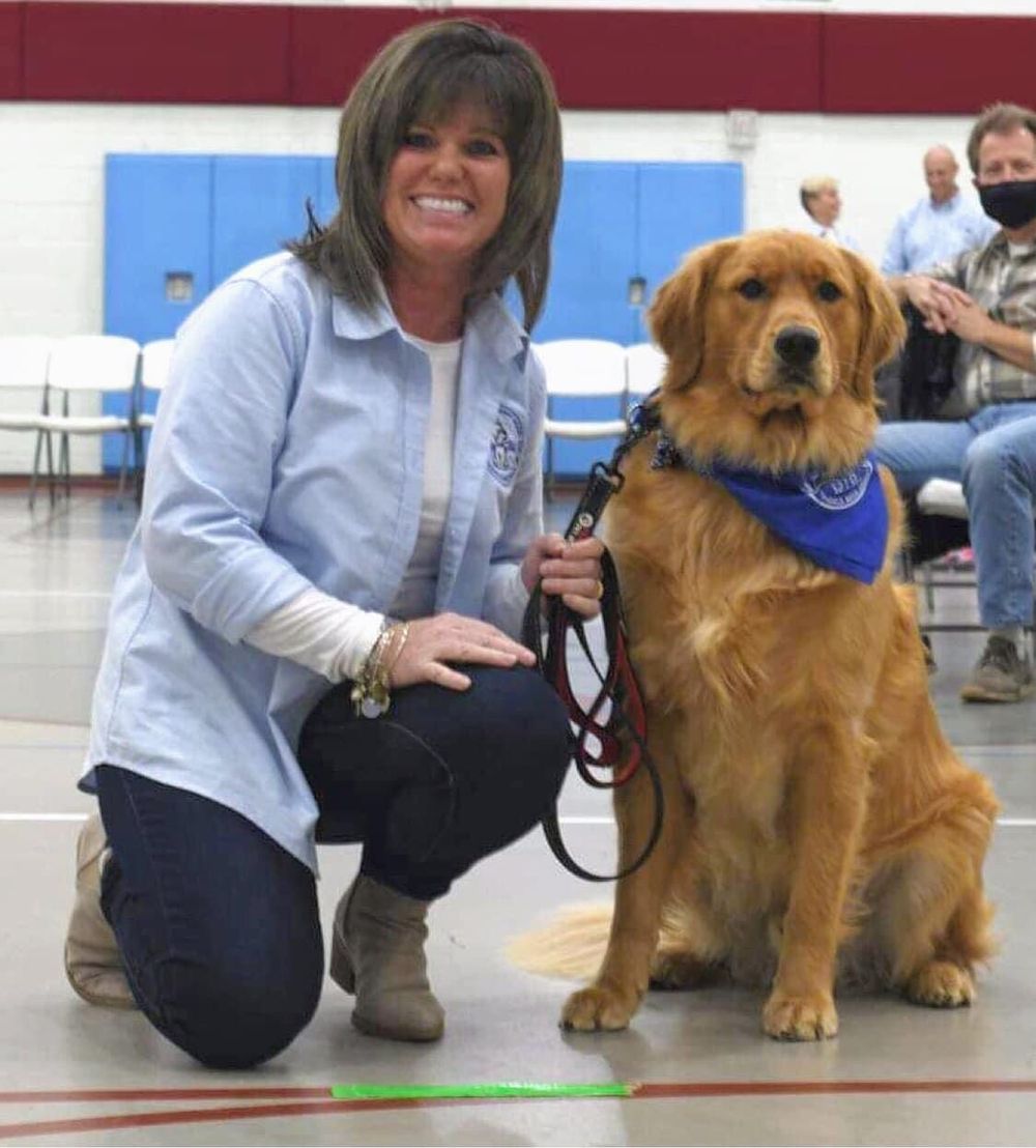 I am a certified therapy dog handler and volunteer on my spare time with Teddy the Golden Retriever through Mid-Michigan Therapy Dogs.