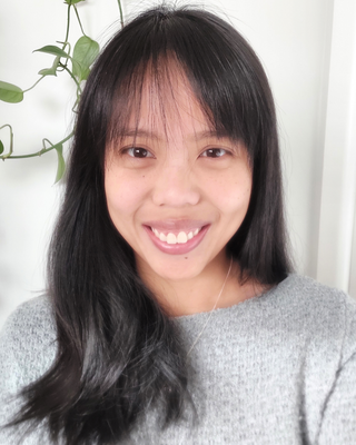 Photo of Dr Melody Tan, Psychologist, PhD, PsyBA - Clin. Psych