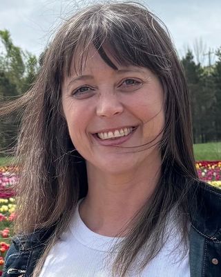 Photo of Elizabeth Muehlbacher, Registered Social Worker, MSW, RSW, SEP