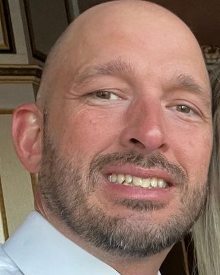 Photo of John Michael Barnett, Psychiatric Nurse Practitioner, FNP-C, PMHNP