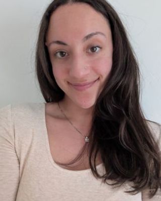 Photo of Violet Fludzinski, Counselor, MA, LMHC